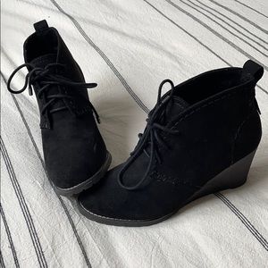 Black wedge booties
